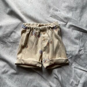 Beige Shorts with Bicycle Print